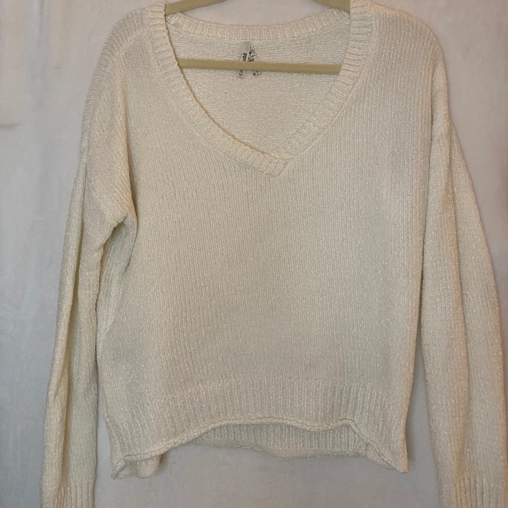 White fuzzy sweater